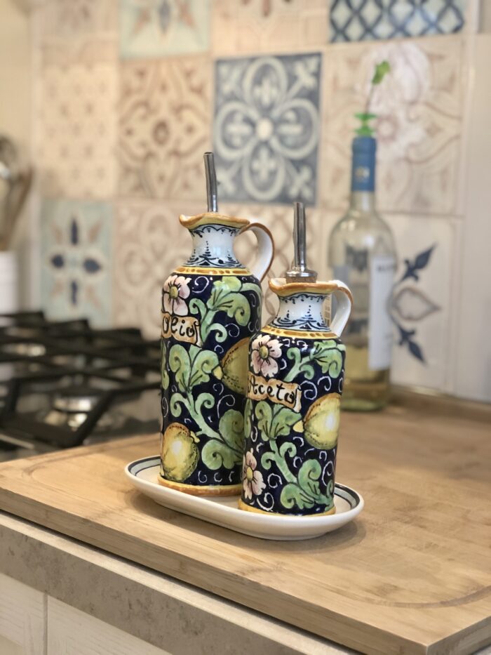Cruet oil and vinegar lemons blue background - Image 4